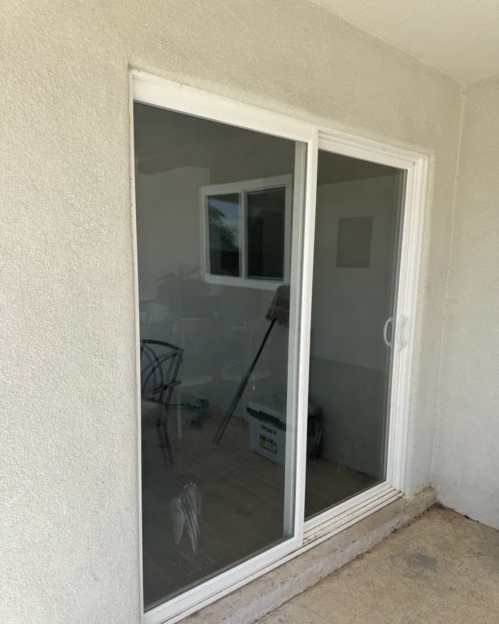 White sliding patio door seen from outside